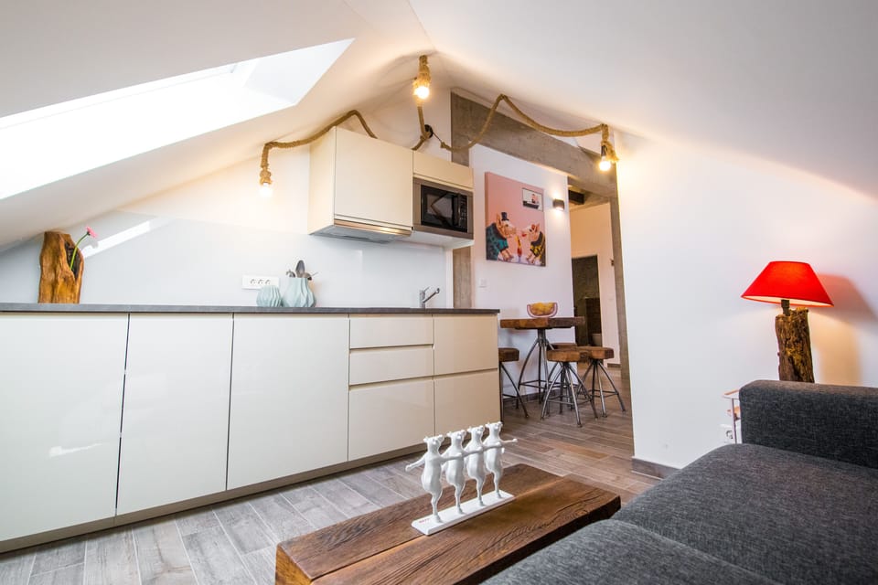 Design Loft | Private kitchen | Mini-fridge, electric kettle, highchair, cookware/dishes/utensils