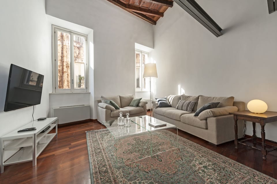 Apartment, 4 Bedrooms | Living area | Flat-screen TV