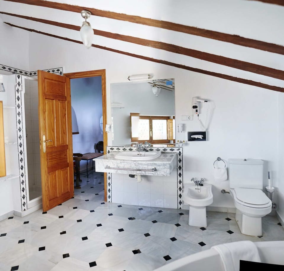 Suite | Bathroom | Combined shower/tub, deep soaking tub, hair dryer, bidet
