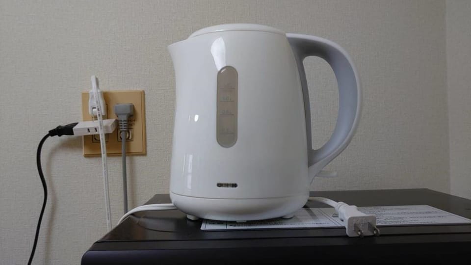 1 Bedroom Apartment | Private kitchenette | Fridge, microwave, stovetop, electric kettle