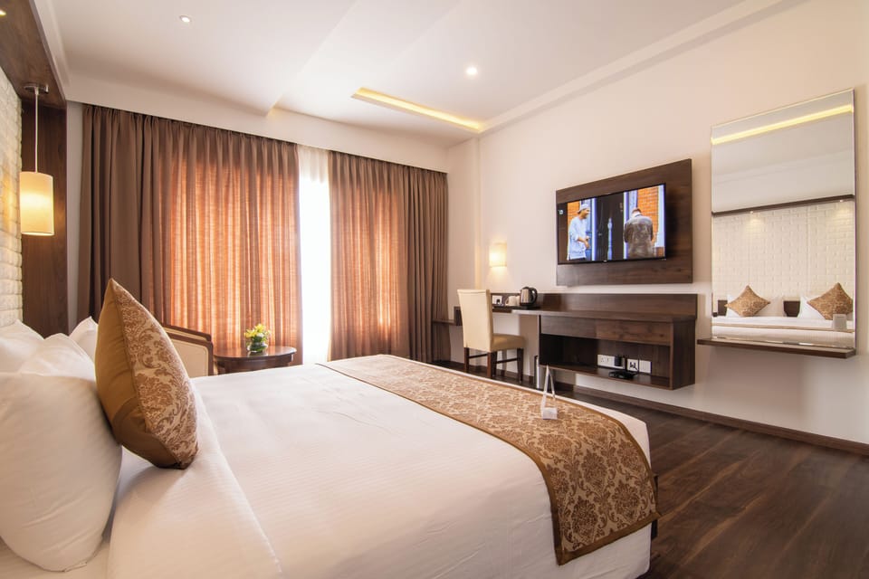 Premium Room | Memory foam beds, in-room safe, individually decorated, desk