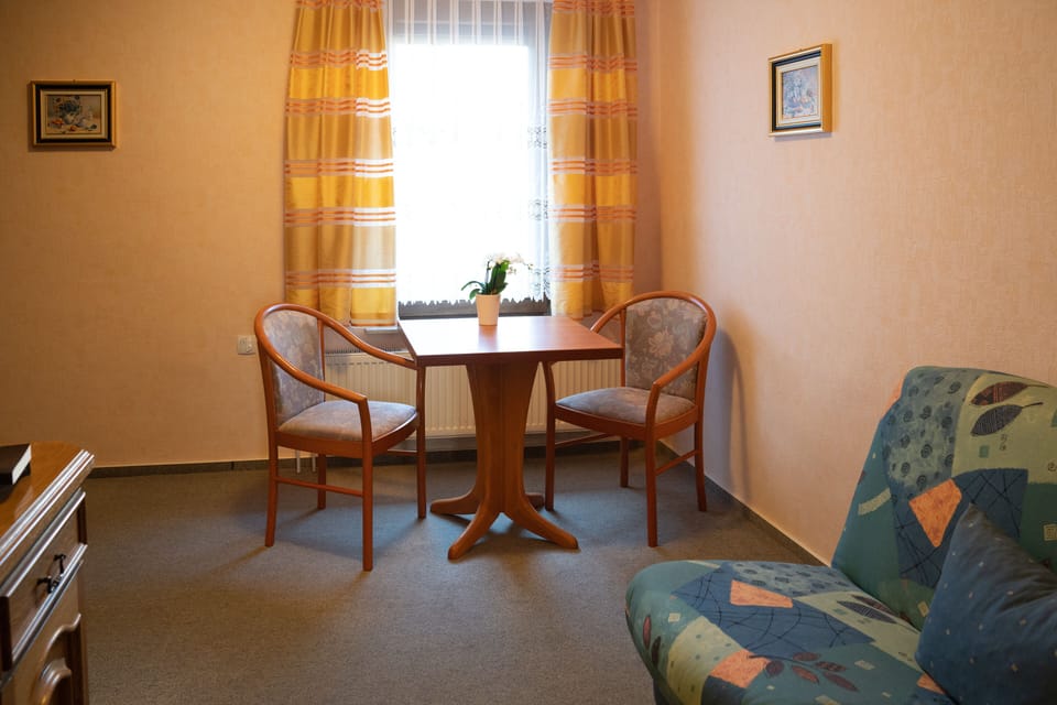 Desk, laptop workspace, free WiFi, bed sheets