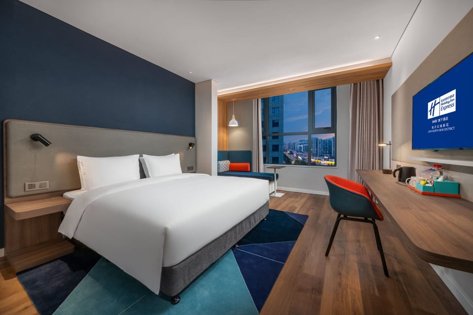 Premium bedding, down comforters, in-room safe, desk