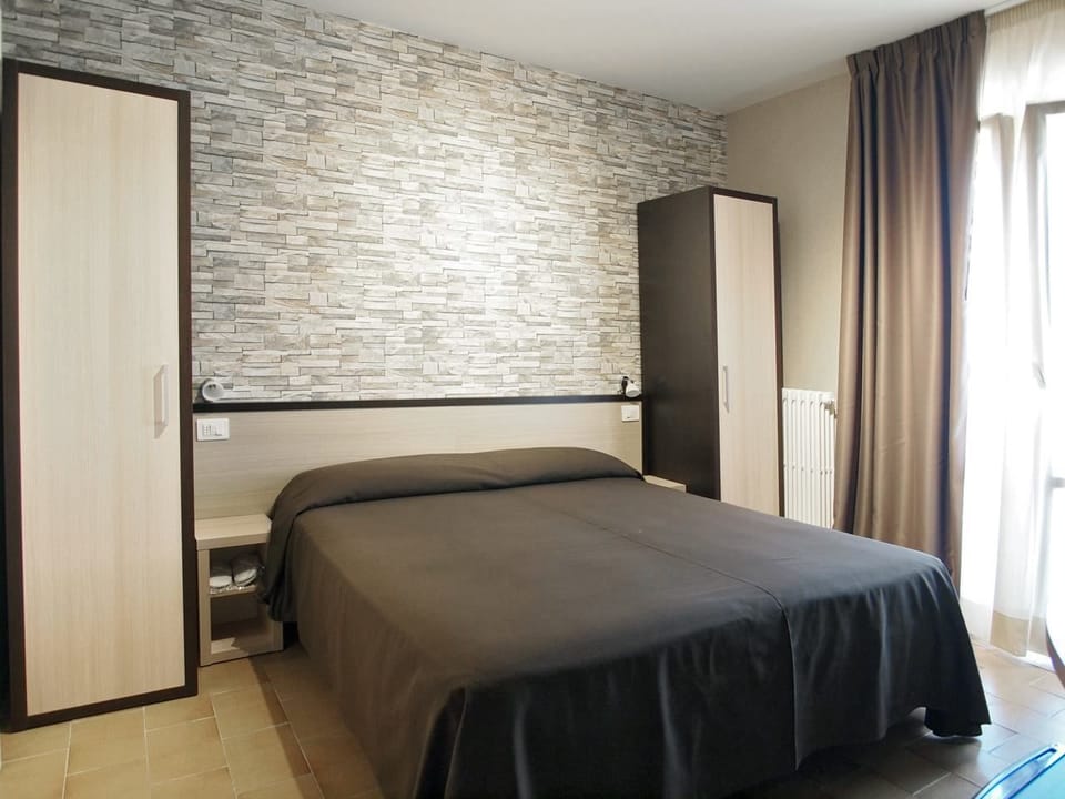 Frette Italian sheets, premium bedding, down comforters