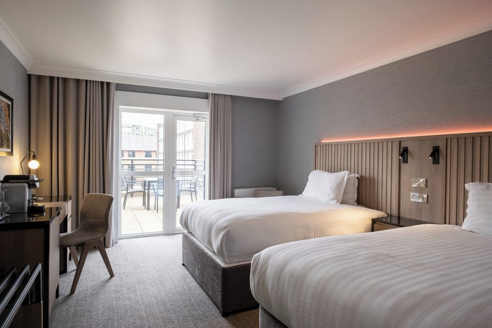 Deluxe Suite, 2 Double Beds, Balcony (Quay View) | In-room safe, desk, laptop workspace, soundproofing