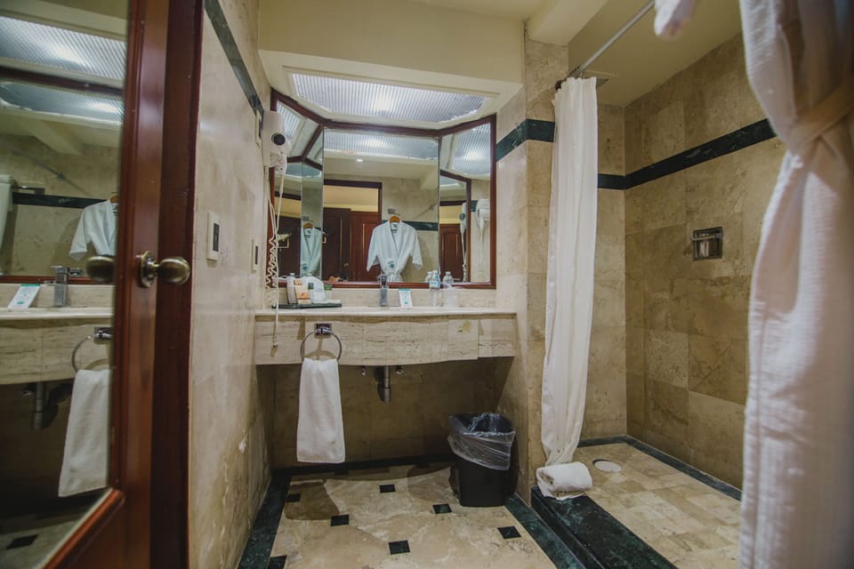 Superior Room, 2 Queen Beds | Bathroom | Shower, hair dryer, towels