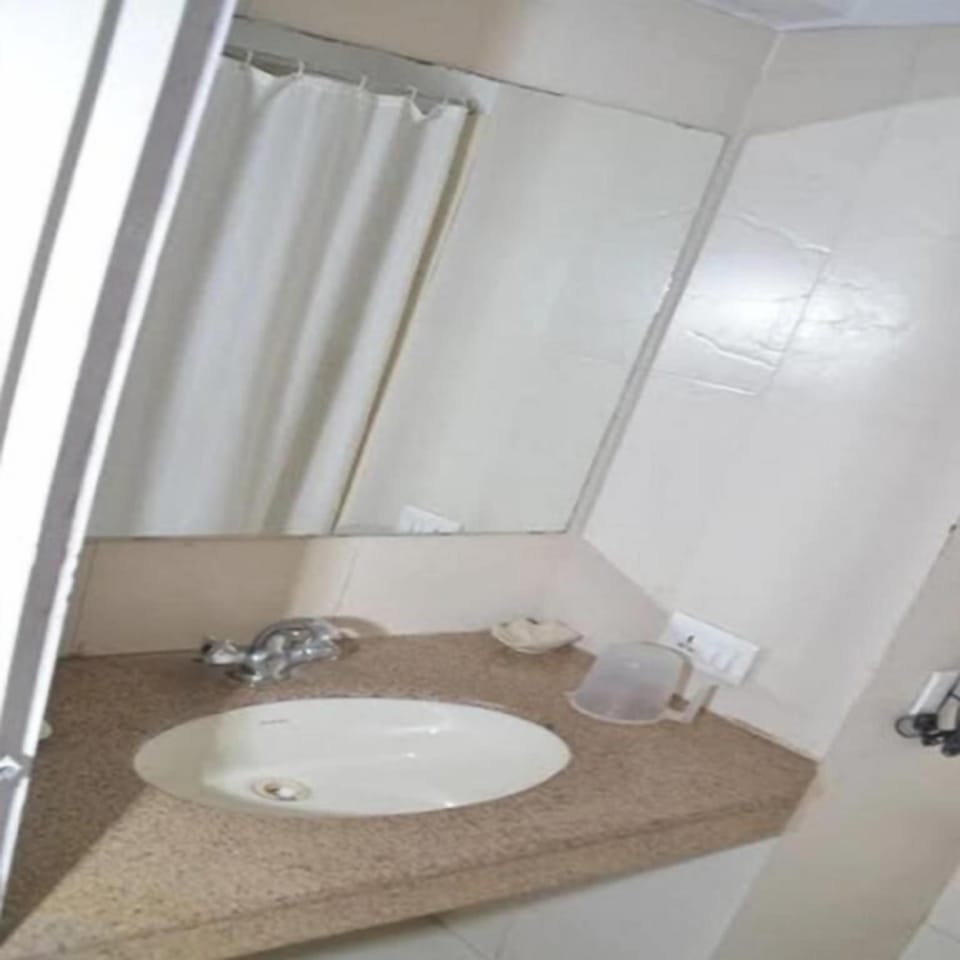 Shower, hydromassage showerhead, slippers, towels