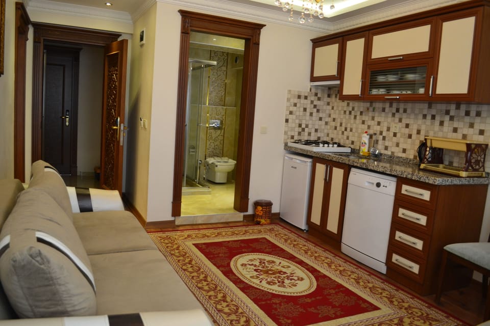 xxDeluxe Suite, Annex Building  | Living area | 35-inch LCD TV with satellite channels, TV, DVD player