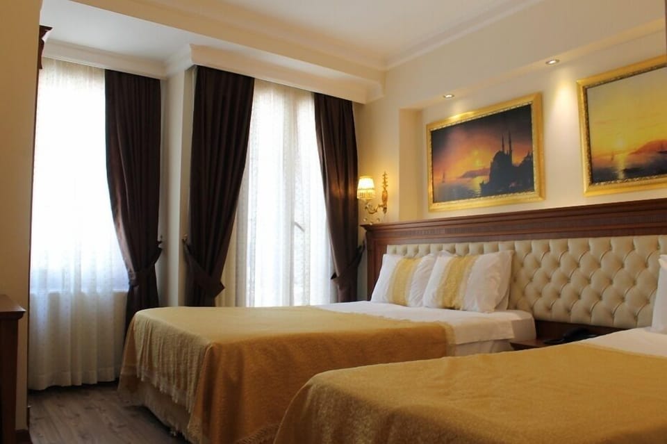Budget Triple Room | Frette Italian sheets, premium bedding, down comforters