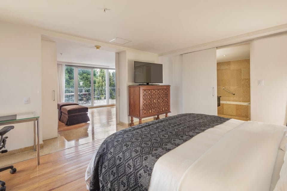 Suite, 2 Bedrooms | Egyptian cotton sheets, premium bedding, down comforters, in-room safe