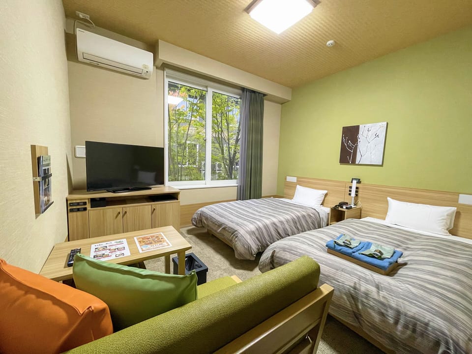Comfort Twin Room, Non Smoking | Desk, WiFi (free), bed sheets