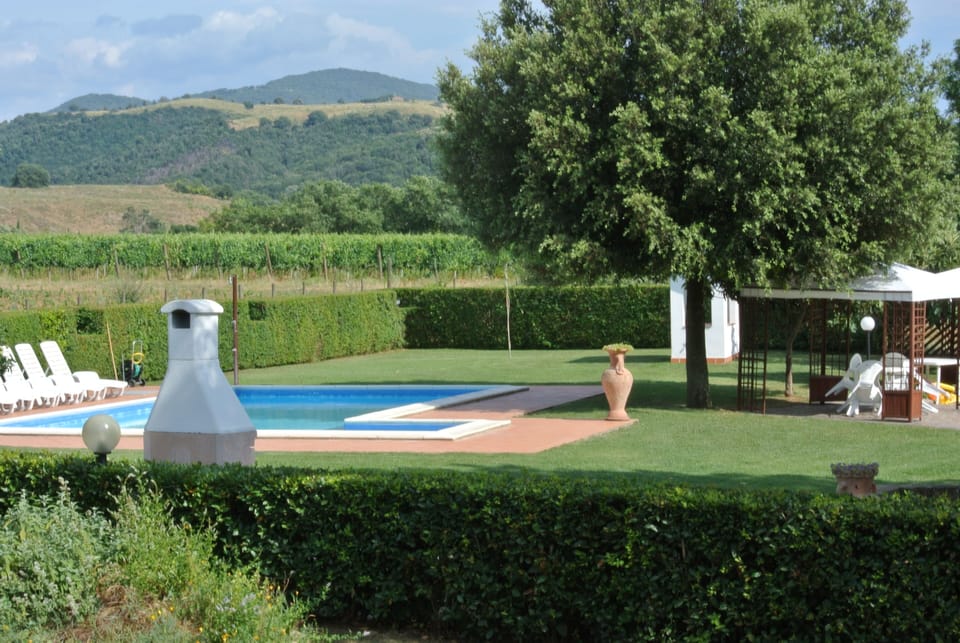 Seasonal outdoor pool, open 8:00 AM to 8:00 PM, sun loungers