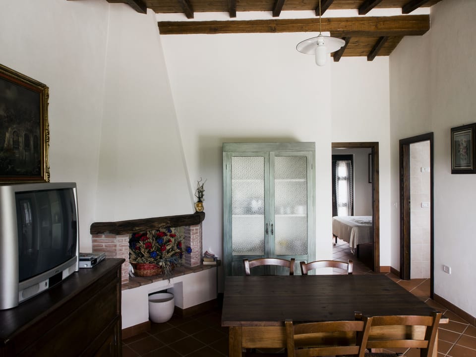 House, 2 Bedrooms (Rosmarino) | Living area | Flat-screen TV
