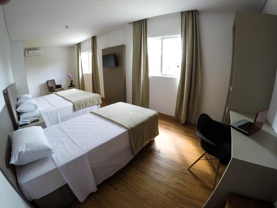 Deluxe Triple Room | Minibar, desk, laptop workspace, free WiFi