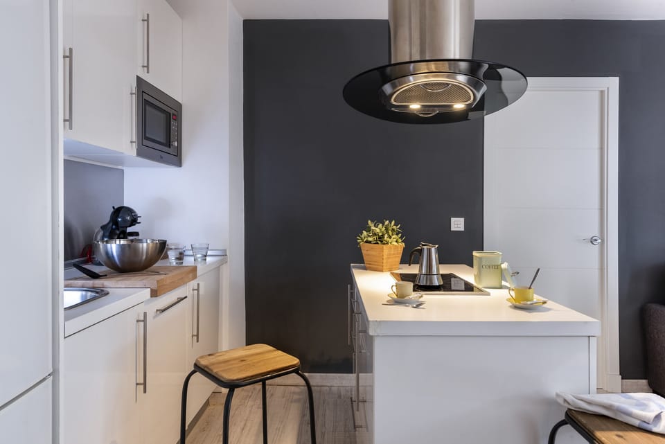 Apartment | Private kitchen | Full-size fridge, microwave, coffee/tea maker, cookware/dishes/utensils