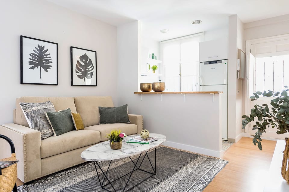 Apartment, 2 Bedrooms | Living area | 32-inch TV with cable channels