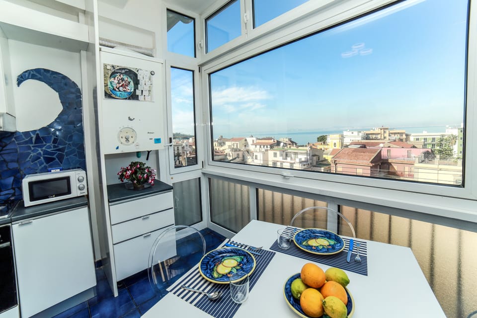 Family Apartment, 2 Bedrooms, Sea View | Private kitchen | Full-size fridge, microwave, oven, stovetop