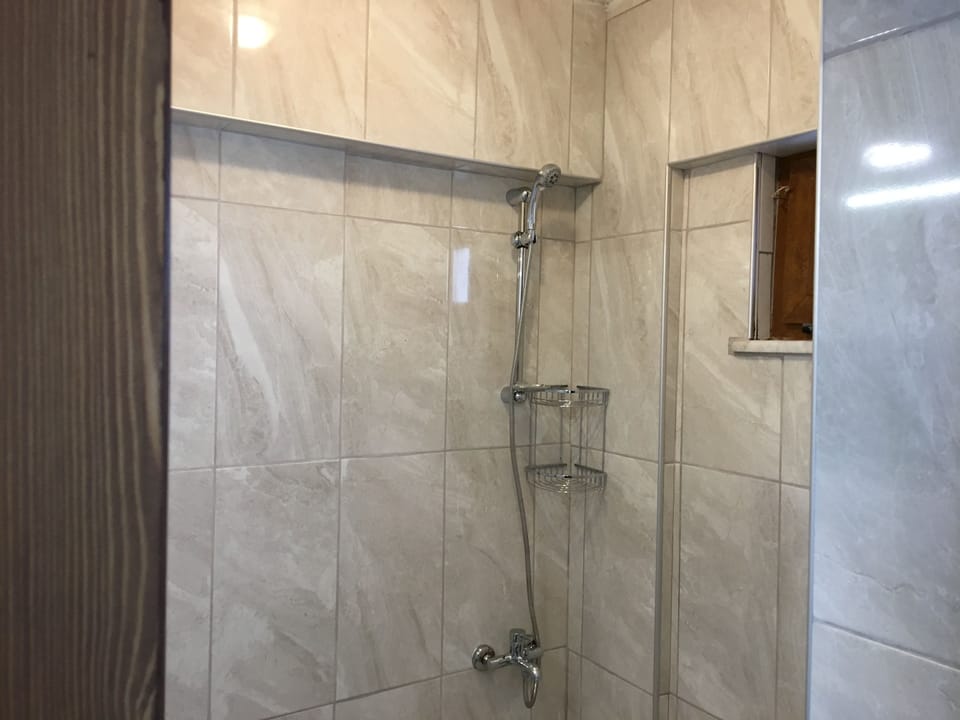 Classic Double Room | Bathroom | Shower, hair dryer, slippers, towels