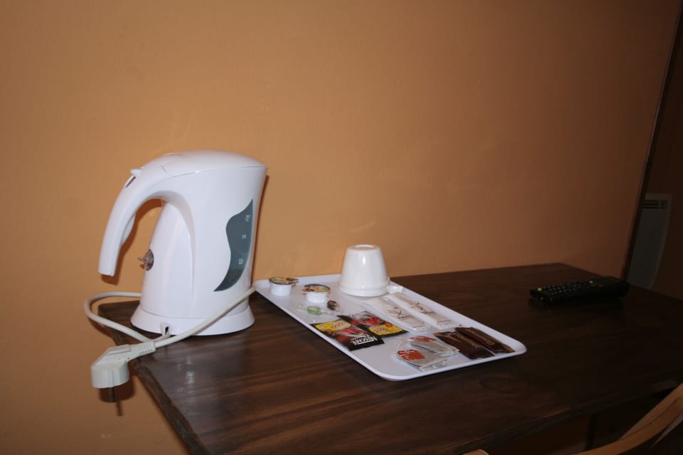 Family Room, Shared Bathroom | Coffee and/or coffee maker
