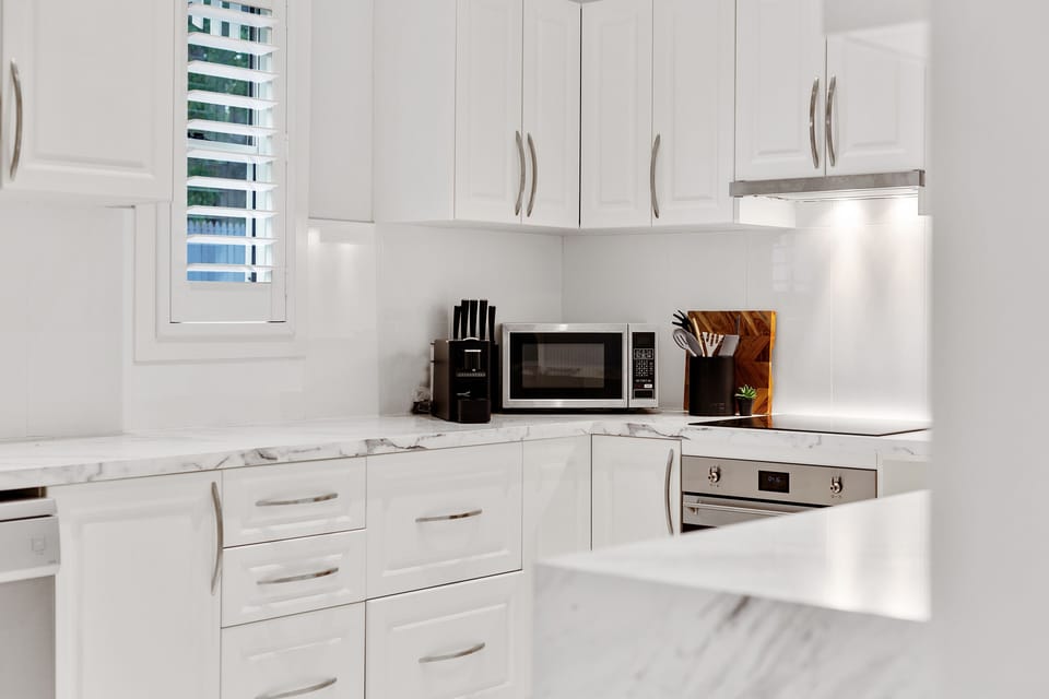 Luxury House | Private kitchen | Espresso maker, coffee/tea maker, full-size fridge, microwave