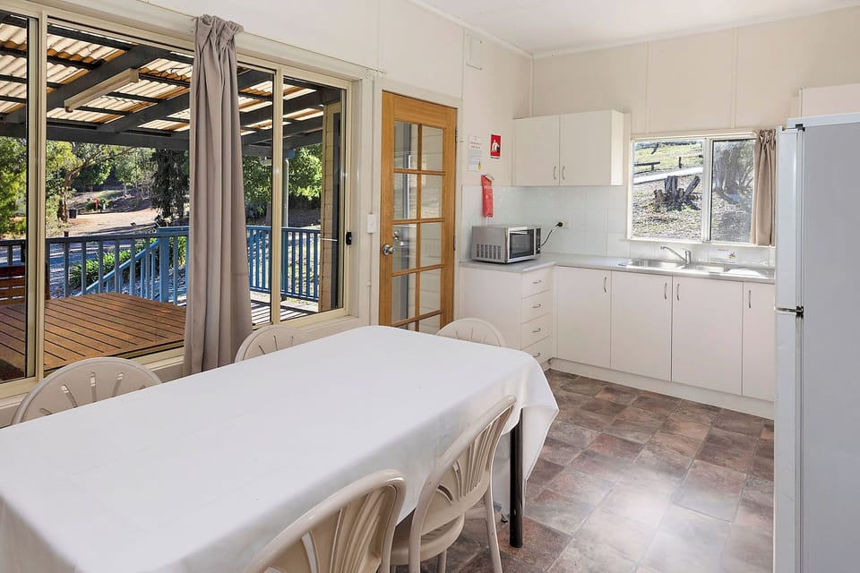 Standard Cabin - Sleeps 8 | Private kitchen | Microwave, stovetop, toaster, cookware/dishes/utensils