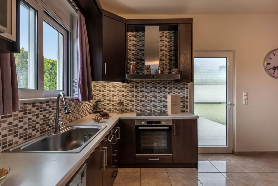 Family Villa, 4 Bedrooms | Private kitchen | Full-size fridge, microwave, oven, stovetop