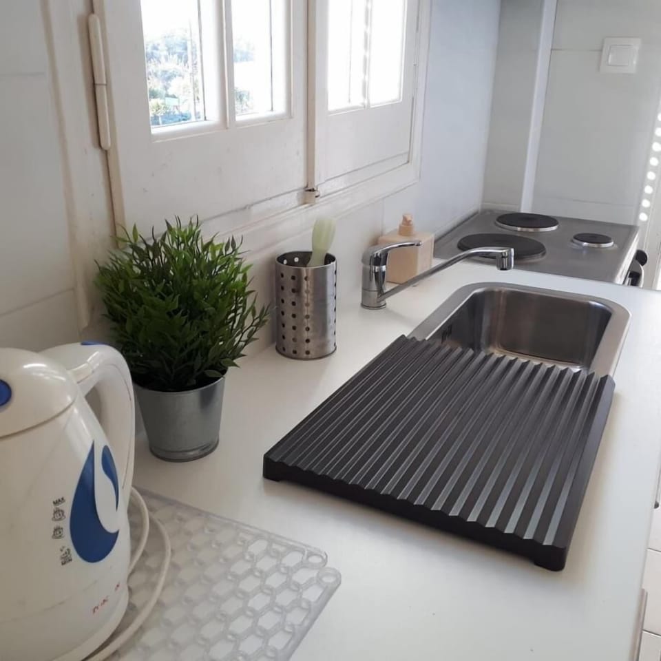 Standard Double Room | Private kitchen | Full-size fridge, electric kettle, cookware/dishes/utensils