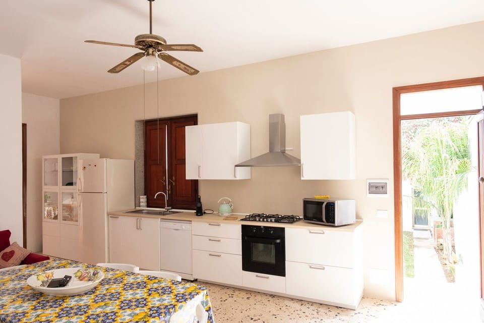 Apartment, 3 Bedrooms | Private kitchen | Full-size fridge, oven, stovetop, dishwasher