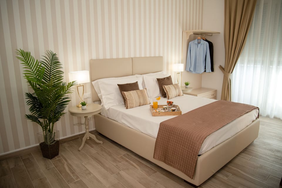 Deluxe Room (Beige) | Down comforters, memory foam beds, minibar, in-room safe