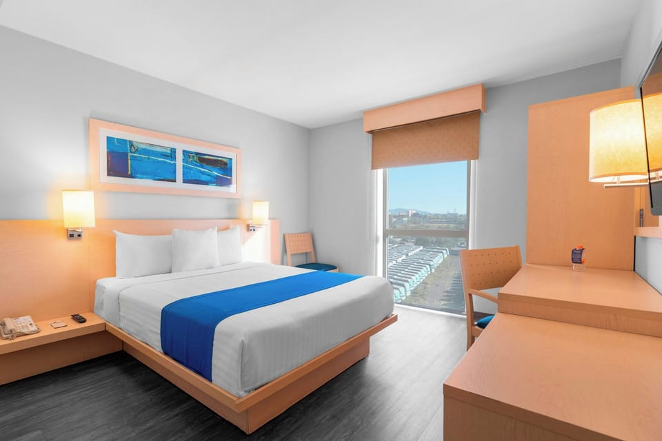 Room, 1 Queen Bed | In-room safe, desk, iron/ironing board, free WiFi
