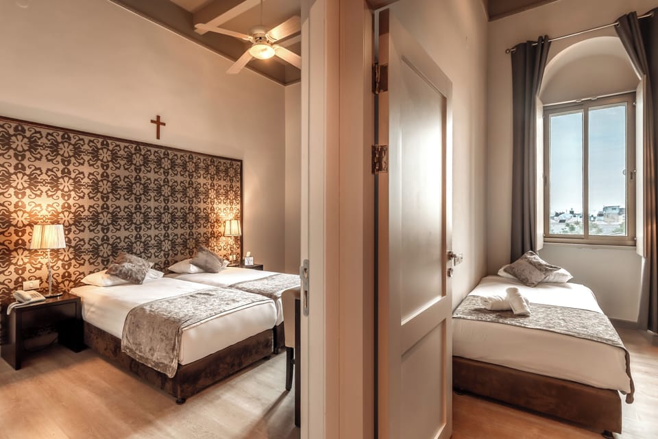 Family Room, Private Bathroom | In-room safe, desk, laptop workspace, blackout drapes