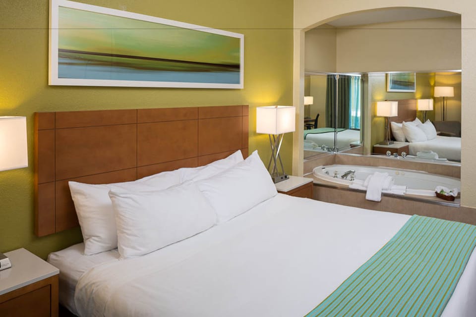 Suite, 1 King Bed, Accessible (Communications) | Desk, laptop workspace, blackout drapes, iron/ironing board