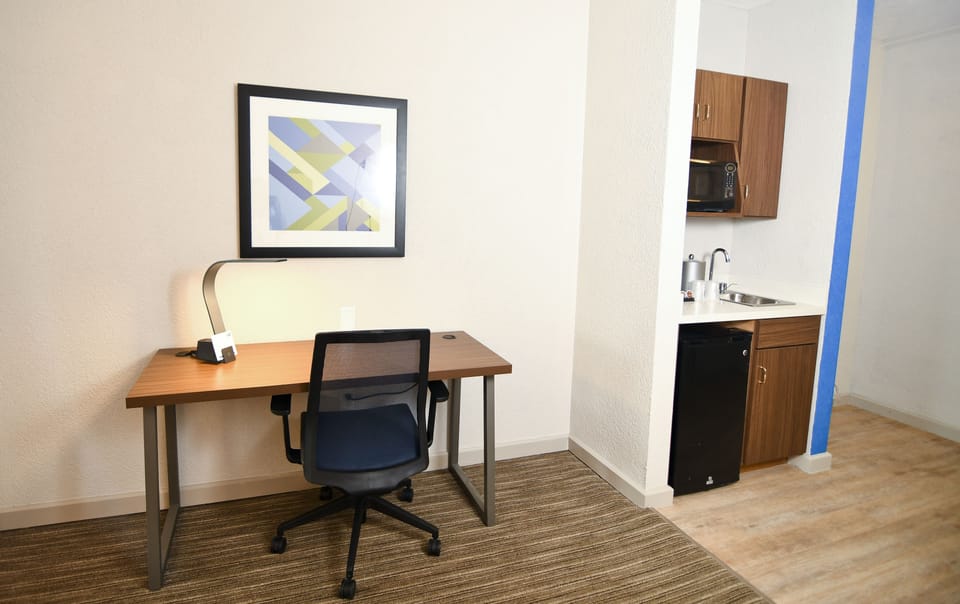 Suite, 1 King Bed | 1 bedroom, premium bedding, in-room safe, desk