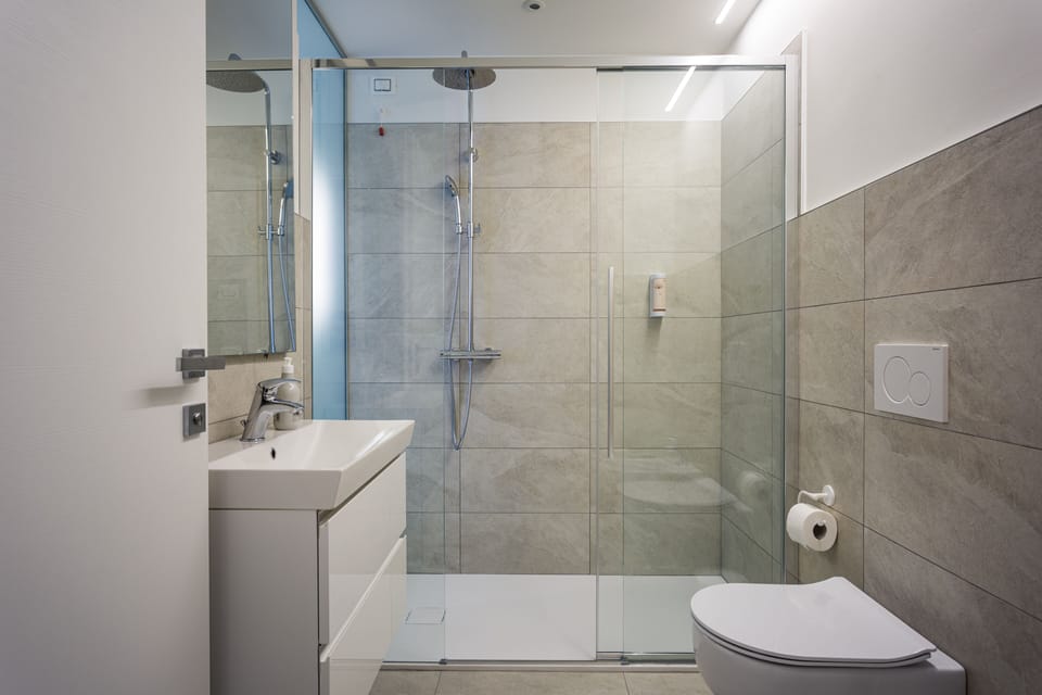 Double Room, Balcony (Bastia) | Bathroom | Shower, free toiletries, hair dryer, bidet