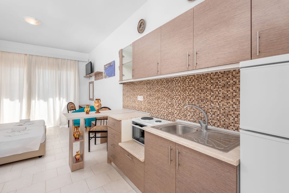 Superior Room, Private Pool, Pool View | Private kitchen | Fridge, stovetop, coffee/tea maker, electric kettle