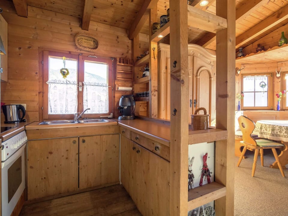 Chalet | Private kitchen | Microwave, coffee/tea maker, highchair