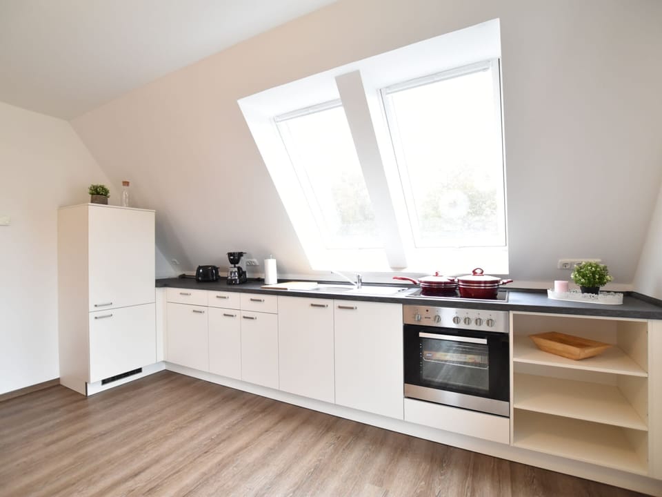 Apartment | Private kitchen | Stovetop, electric kettle, toaster