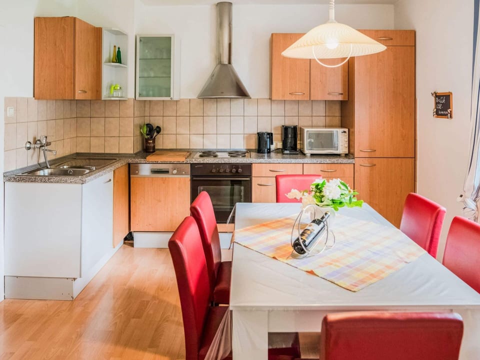 Apartment | Private kitchen | Stovetop, highchair