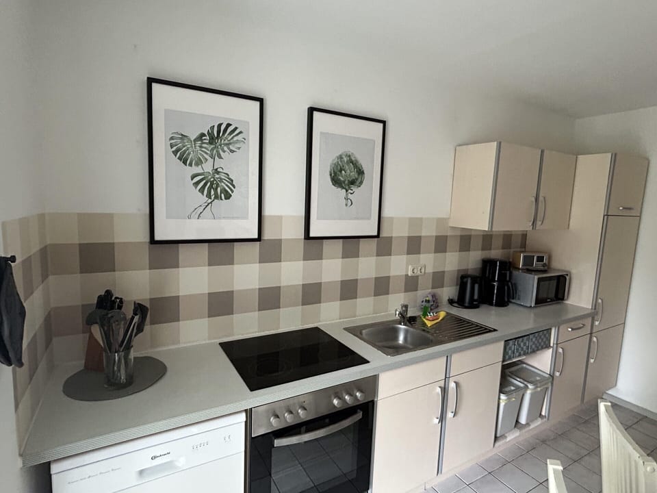 Apartment | Private kitchen | Stovetop, highchair