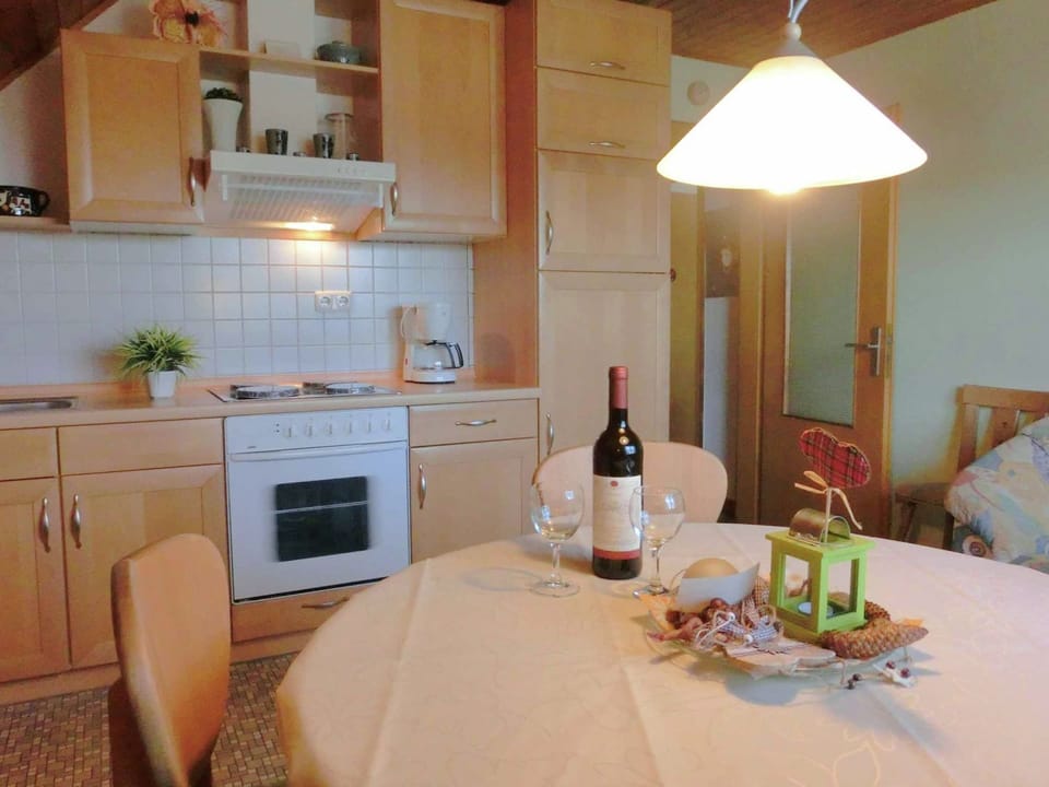 Apartment | Private kitchen | Microwave, stovetop, highchair, cookware/dishes/utensils