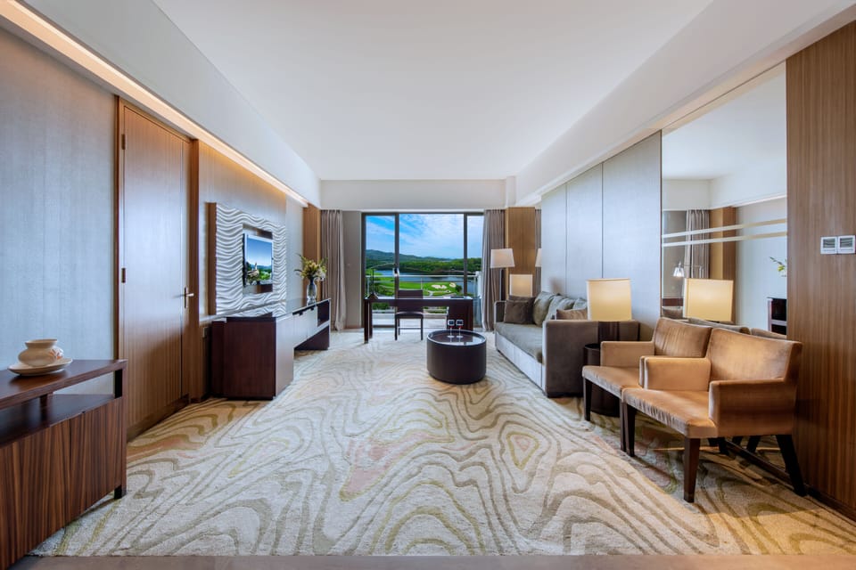 Grande Deluxe Suite With Lake View | In-room safe, desk, laptop workspace, blackout drapes