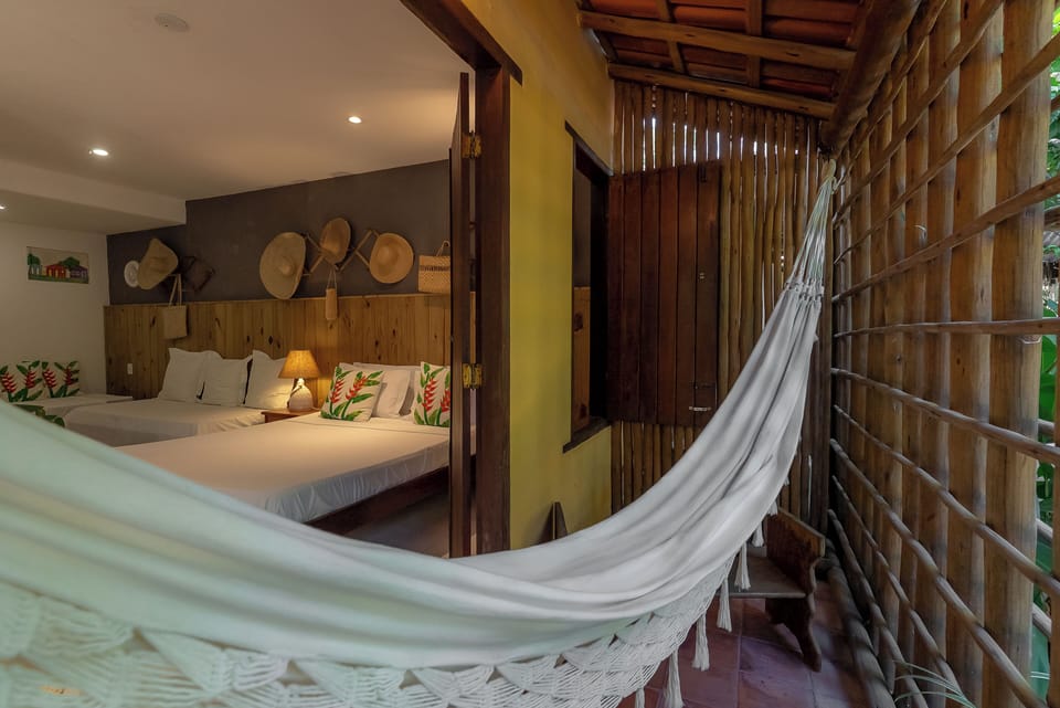 Family Quadruple Room | Minibar, individually decorated, individually furnished, free WiFi