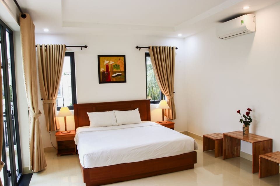 Deluxe Double Room, Balcony, Garden View | Minibar, desk, blackout drapes, soundproofing