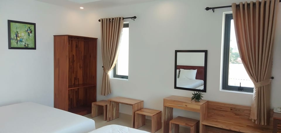 Family Room, 2 Queen Beds | Minibar, desk, blackout drapes, soundproofing