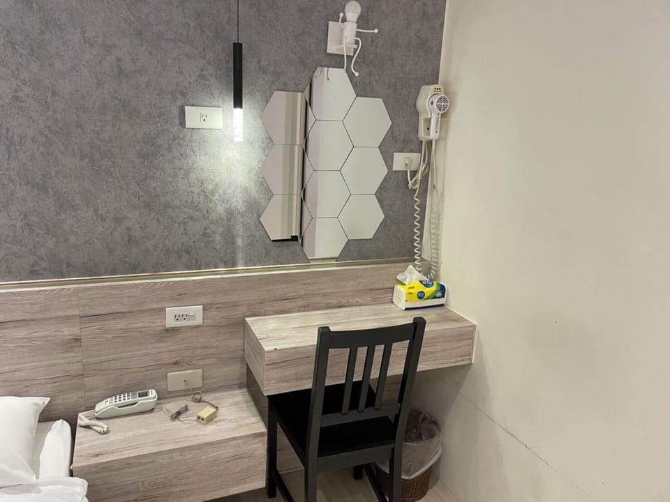 Desk, blackout drapes, free WiFi, bed sheets