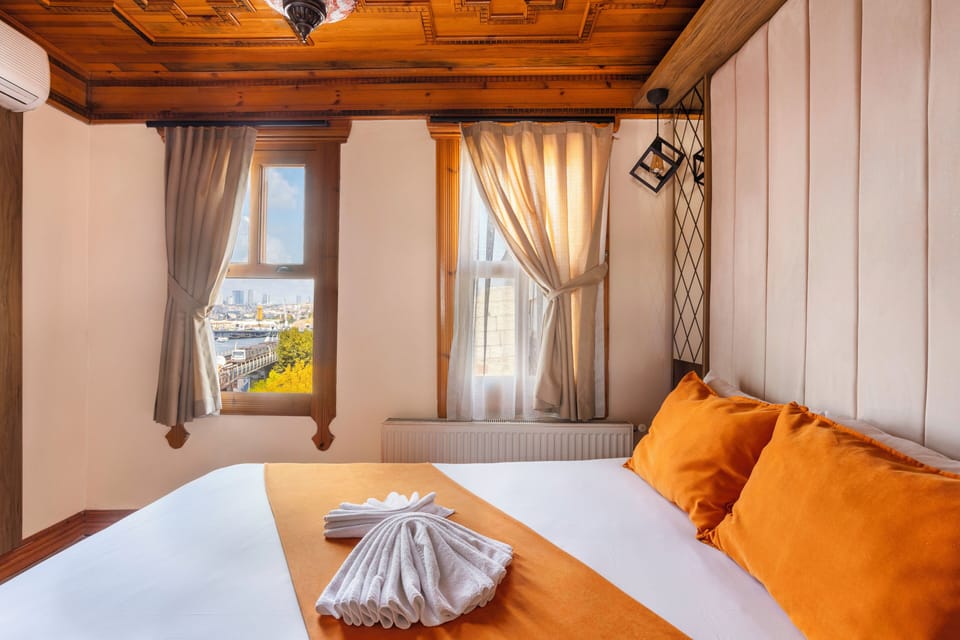Deluxe Room, Partial Sea View | Iron/ironing board (on request), cribs (surcharge), WiFi (free)