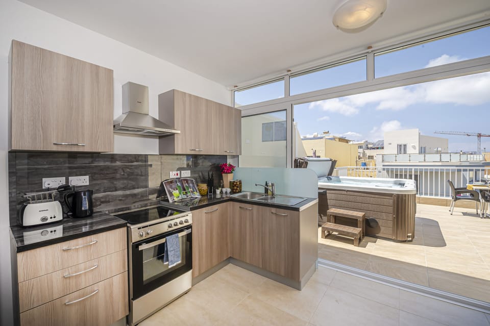 Apartment, 3 Bedrooms | Private kitchen | Full-size fridge, microwave, oven, stovetop