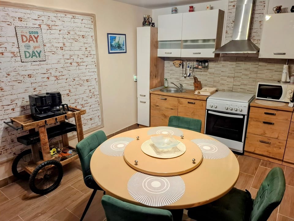 Apartment (A1) | Private kitchen | Fridge, microwave, stovetop, coffee/tea maker