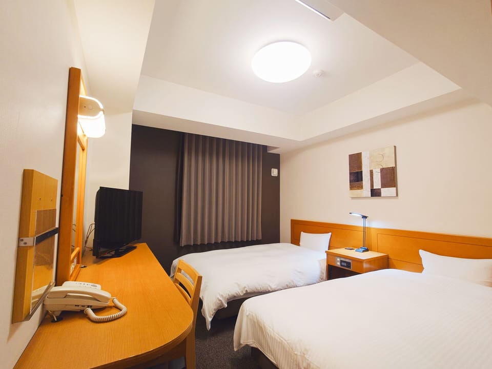 Desk, WiFi (free), bed sheets