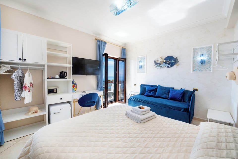Superior Triple Room, Sea View | Premium bedding, down comforters, memory foam beds, minibar